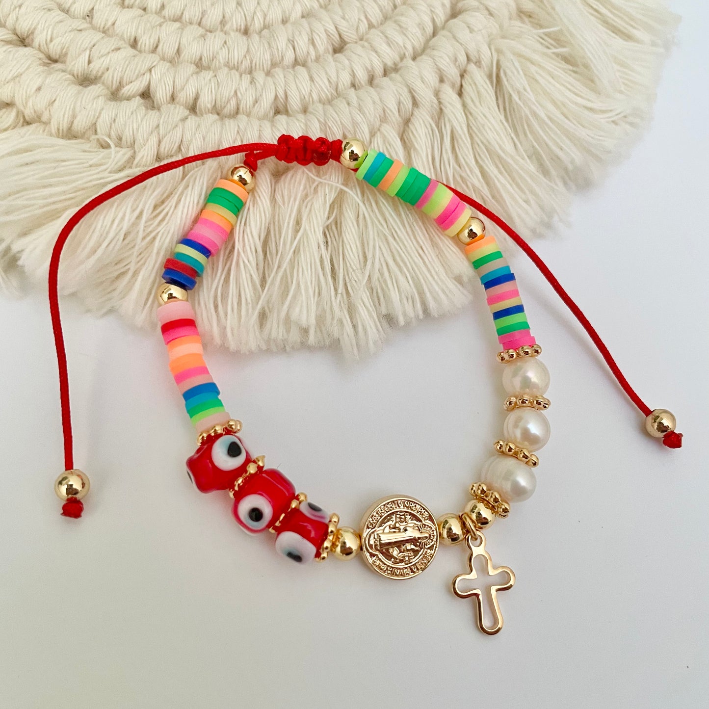 Pulsera Mix: Ojos, Perlas, San Benito y Cruz